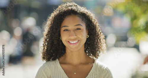 Young black woman smile face portrait on city street