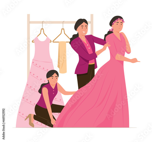 Fashion Stylist Woman Fitting Wedding Dress for Bride