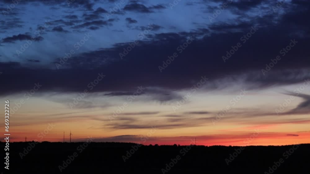 windmill on horizon sunset sky landscape