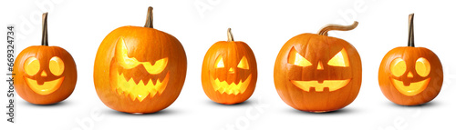 Many pumpkins with carved spooky faces isolated on white, collection. Jack-o-lantern for Halloween photo