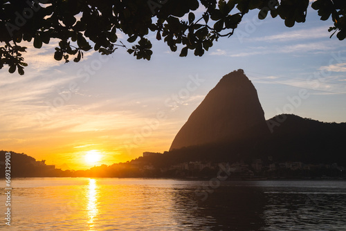 Morning sunrise silhouette of Sugarloaf Mountain Pao de Acucar and Guanabara Bay in Rio de Janeiro, Brazil photo