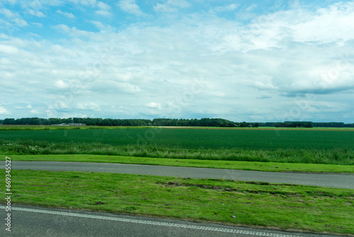 Netherlands, Harderwijk, Dolfinarium, a large green field with trees in the background