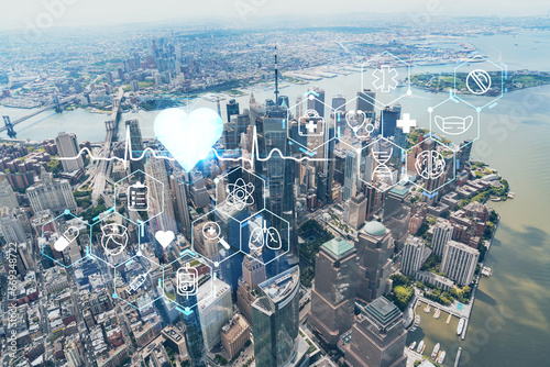 Aerial panoramic helicopter city view, Lower Manhattan, Downtown, New York, USA. World Trade Center, bridges. Health care digital medicine hologram. The concept of treatment and disease prevention