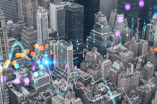 Aerial birds eye panoramic city view of Upper Manhattan area and East Side neighborhoods, New York city, USA. Forex candlestick graph hologram. The concept of internet trading, brokerage, analysis