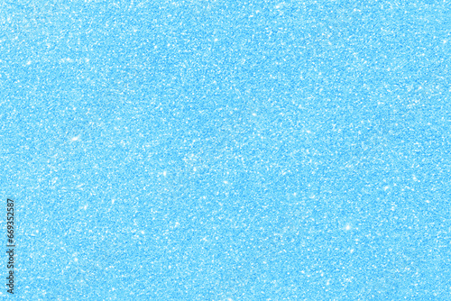 Blue glitter texture background.  New Year, Christmas and all celebration background concepts. 