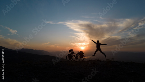 Sunrise Adventure: Cyclist Integrating with Nature