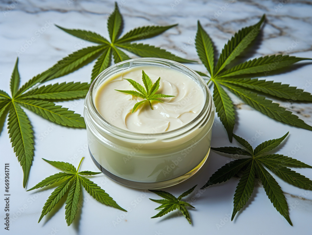 Natural cosmetics hemp cream with marijuana leaves and seeds - current concept of cannabis oil. Natural cosmetics hemp cream with marijuana leaves and seeds - current concept of cannabis oil.