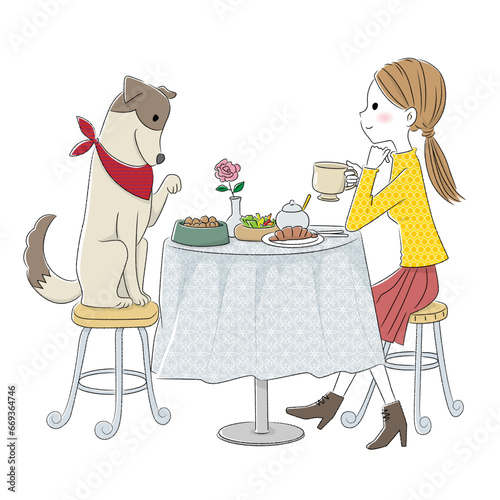 愛犬とカフェで食事をする女の子