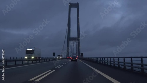 The drive over the Great Belt Bridge, Storebaeltsbroen, Denmark, between the Danish islands of Zealand and Funen. photo