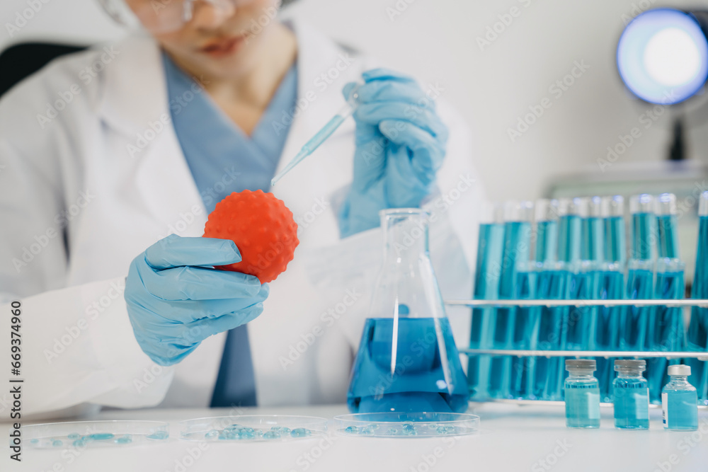 Medical test vaccine research and development concept. Scientist in laboratory study and analyze scientific sample of antibody. Medical test vaccine research and development concept. Scientist in laboratory study and analyze scientific sample of antibody.
