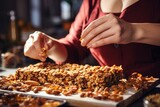 Woman making granola bars with nuts at table food. Raw snack calorie organic. Generate Ai