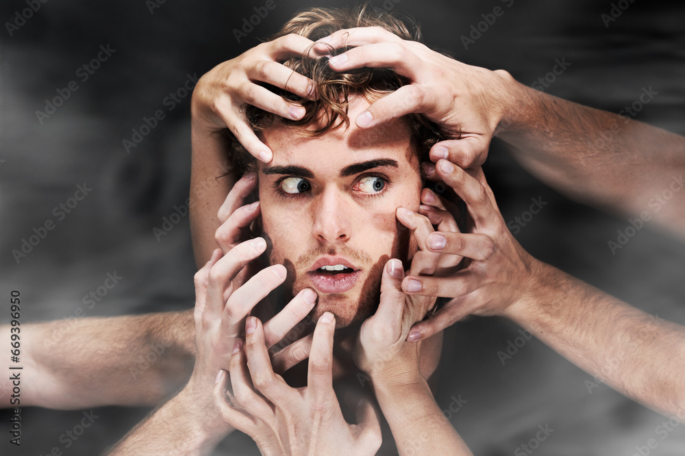 Scared, schizophrenia and man with hands, mental health or bipolar in studio isolated on a black background. Face, smoke and person with fear, horror or abuse drugs, hallucination and sick fantasy - obrazy, fototapety, plakaty 