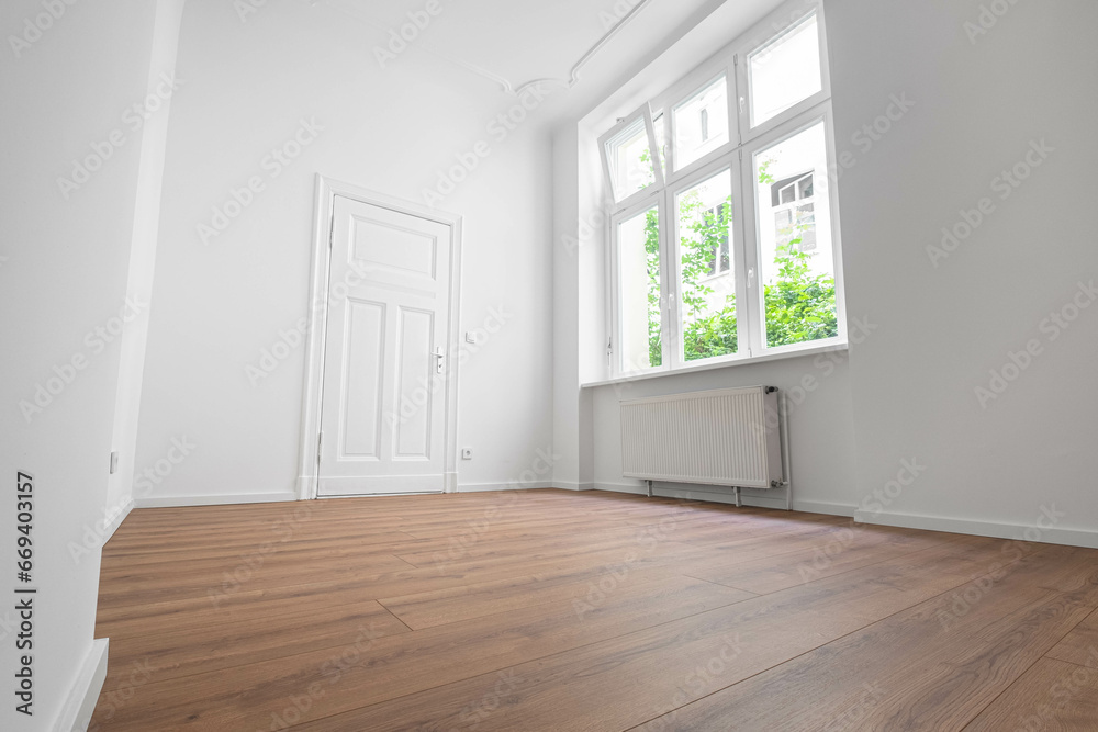empty apartment room,window and flat door, low angle view empty apartment room,window and flat door, low angle view