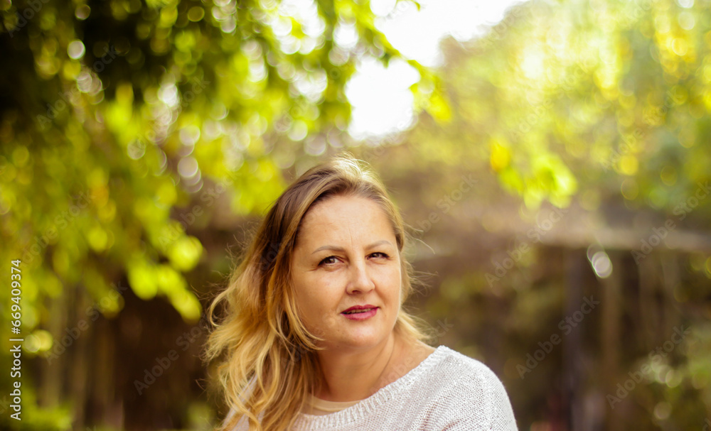 street autumn portrait of a blonde woman of European appearance, selective focus street autumn portrait of a blonde woman of European appearance, selective focus