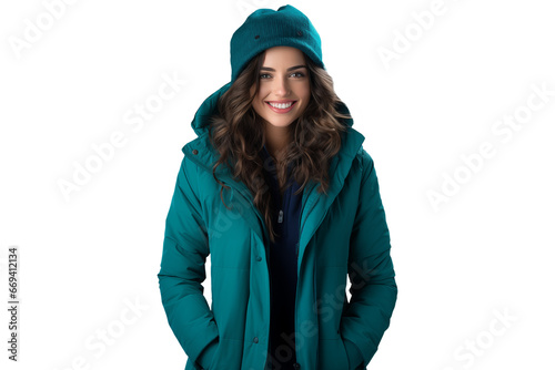 smiling young woman in green parka with hat, winter fashion