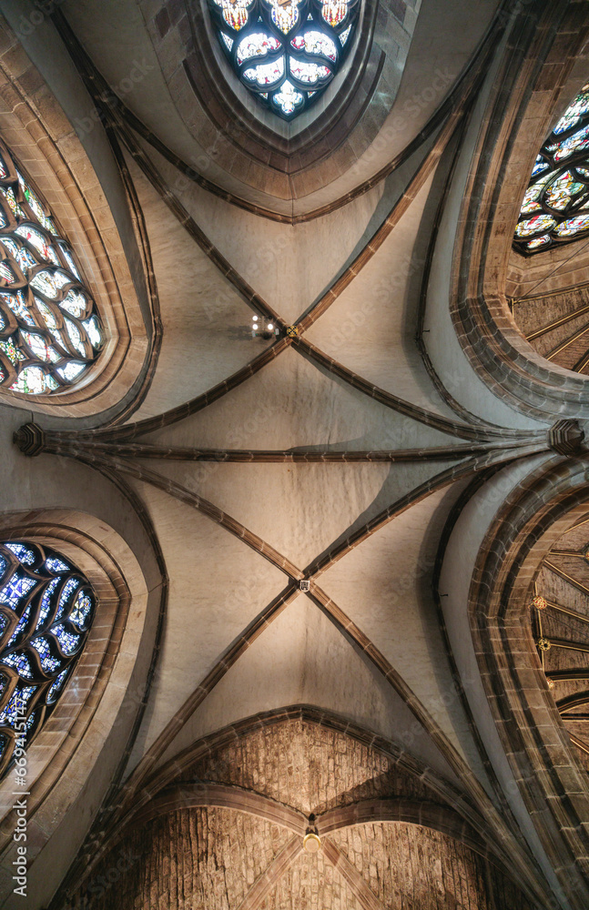 Photo of Ceiling of a Majestic Cathedral With Colorful Stained Glass Windows Photo of Ceiling of a Majestic Cathedral With Colorful Stained Glass Windows