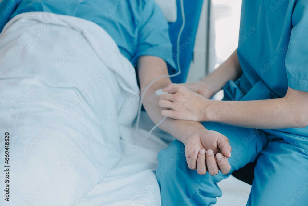 Injured patient showing doctor broken wrist and arm with bandage in hospital office or emergency room. Sprain, stress fracture or repetitive strain injury in hand. Nurse helping customer. First aid. Injured patient showing doctor broken wrist and arm with bandage in hospital office or emergency room. Sprain, stress fracture or repetitive strain injury in hand. Nurse helping customer. First aid.