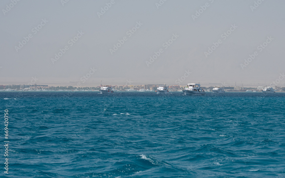 Hurghada, Egypt - August 28, 2022: Vacation in Egypt. Tourist yacht cruise. Holidays in Egypt at the Red Sea. People on the yacht.