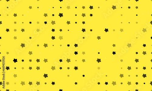 Seamless background pattern of evenly spaced black forget-me-not flowers of different sizes and opacity. Vector illustration on yellow background with stars