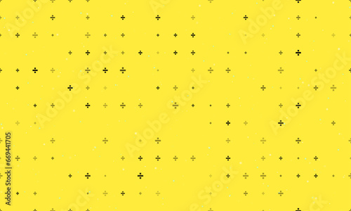 Seamless background pattern of evenly spaced black division symbols of different sizes and opacity. Vector illustration on yellow background with stars