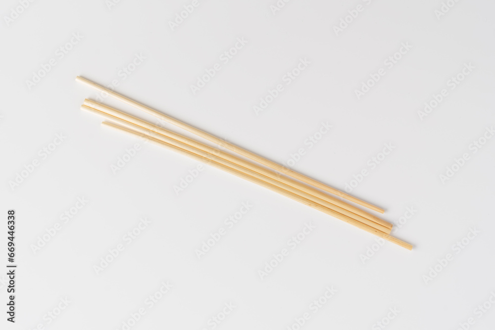 biodegradable drinking straw made from dried grass on white biodegradable drinking straw made from dried grass on white