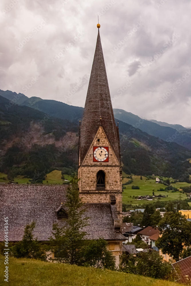 Church on a cloudy summer day at Matrei, Eastern Tyrol, Tyrol, Austria