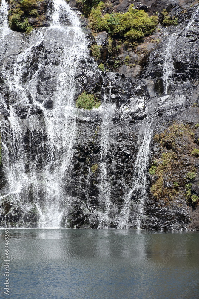 Wide waterfall on a tropical island Wide waterfall on a tropical island