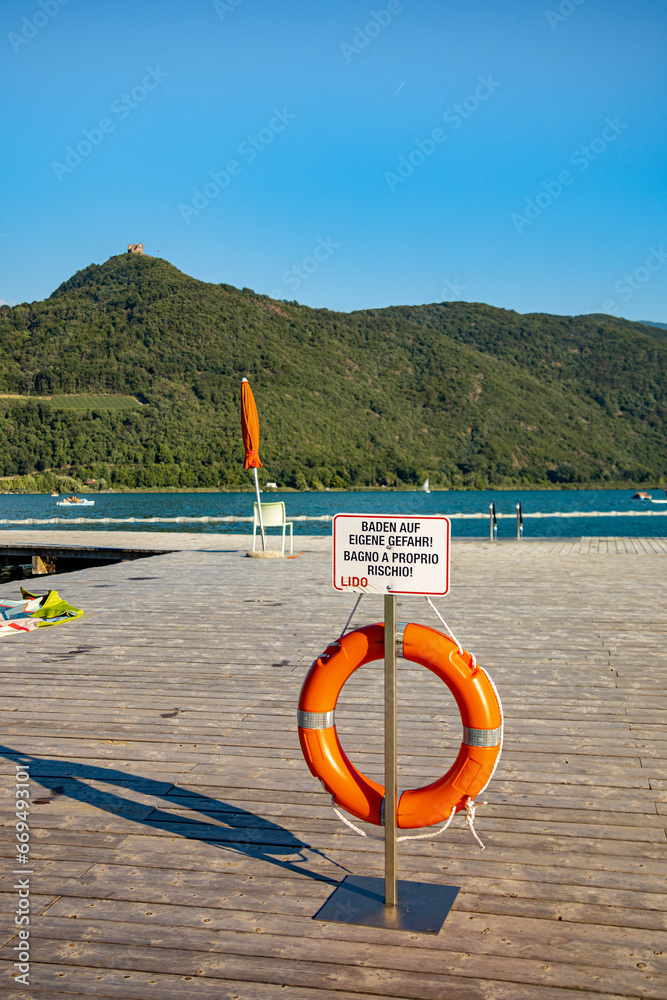 Kaltern, South Tyrol, Italy 08 September 2023 Sign swim at your own risk at Lake Caldaro 