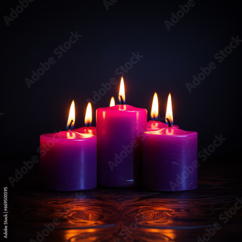 Group of four candle lights, with dark background, with space for text