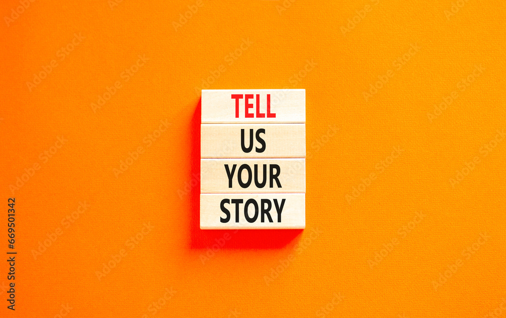 Tell us your story symbol. Concept word Tell us your story on beautiful wooden block. Beautiful orange table orange background. Business tell us your story concept. Copy space. - obrazy, fototapety, plakaty 