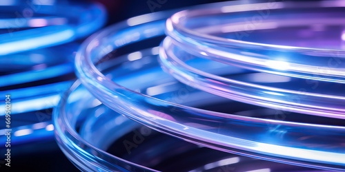 Background of translucent spiraling coils in shades of blue and purple