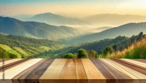 wooden table with a blurry mountain backdrop in the morning or sunset, Warmth in tones of orange or brown photo