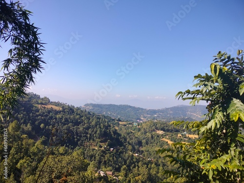 Village mountain sunset sunrise clouds Nepal  photo