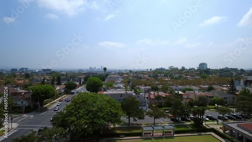 Aerial Shot Of Vehicles On Roads Amidst Houses In Suburb Against Sky - Beverly Hills, California
