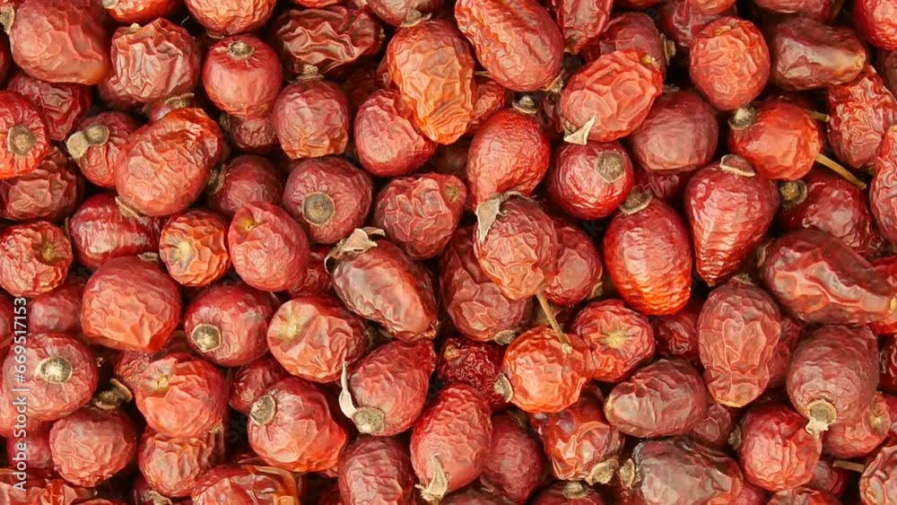 Dried rose hips in a basket.