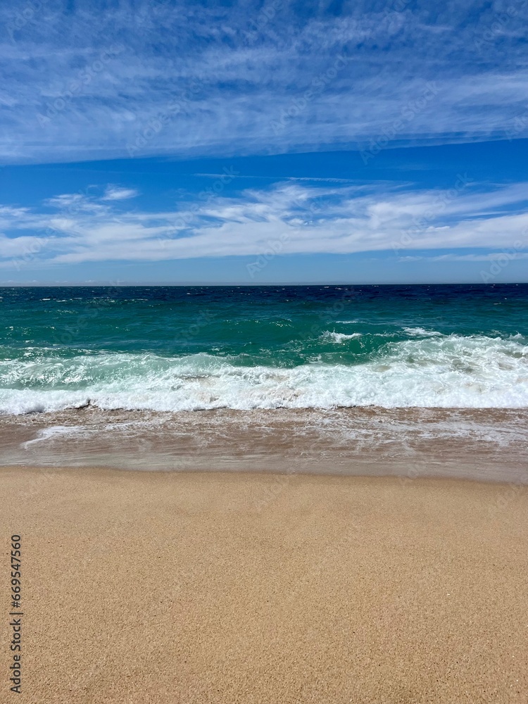 Blue sea horizon, ocean bay, blue sky, sandy coast Blue sea horizon, ocean bay, blue sky, sandy coast