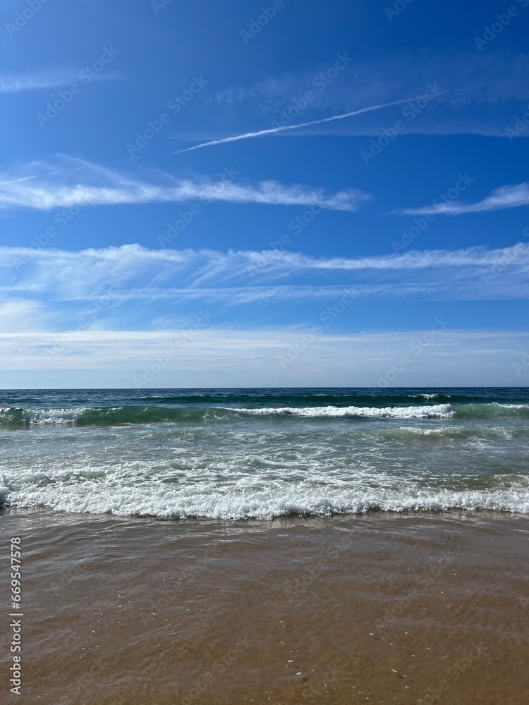 Blue sea horizon, ocean bay, blue sky, sandy coast Blue sea horizon, ocean bay, blue sky, sandy coast