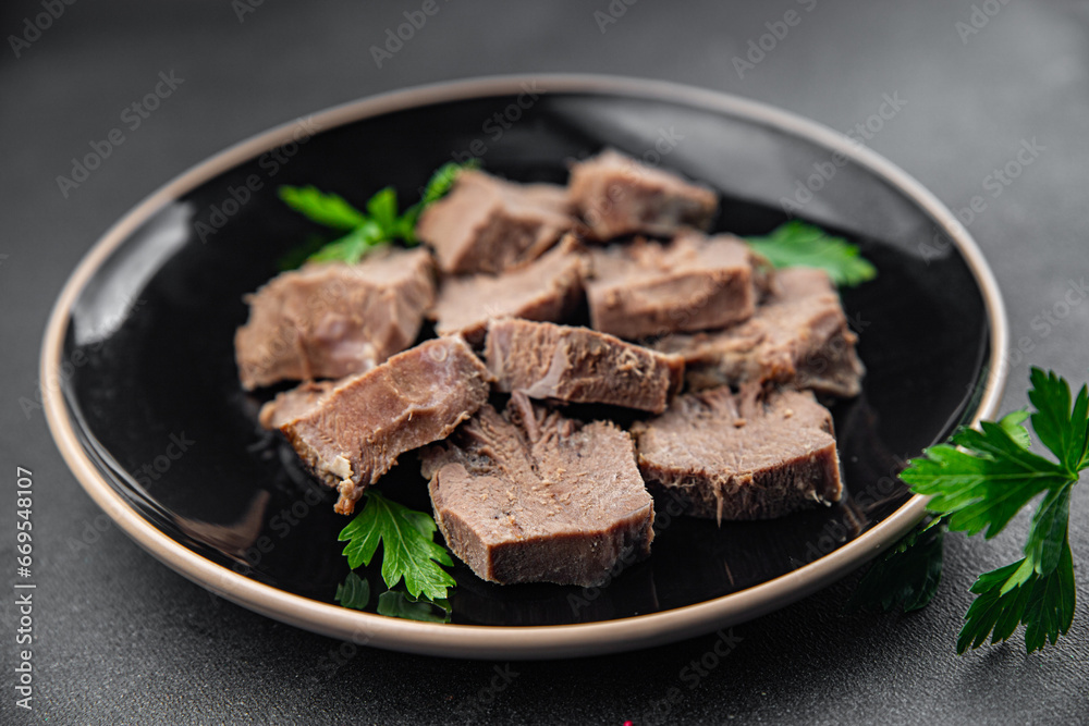 pork tongue cooked meat fresh delicious healthy eating cooking appetizer meal food snack on the table copy space food background rustic top view keto or paleo diet pork tongue cooked meat fresh delicious healthy eating cooking appetizer meal food snack on the table copy space food background rustic top view keto or paleo diet
