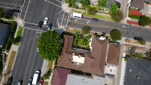 Aerial Shot Of Vehicles On Streets Amidst Houses At Neighborhood In City During Sunny Day - Beverly Hills, California