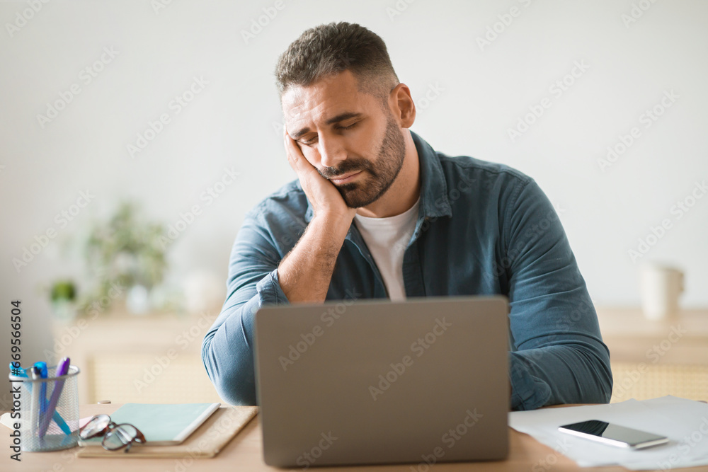 Tired Middle Aged Businessman Napping Near Laptop At Workplace Desk Tired Middle Aged Businessman Napping Near Laptop At Workplace Desk