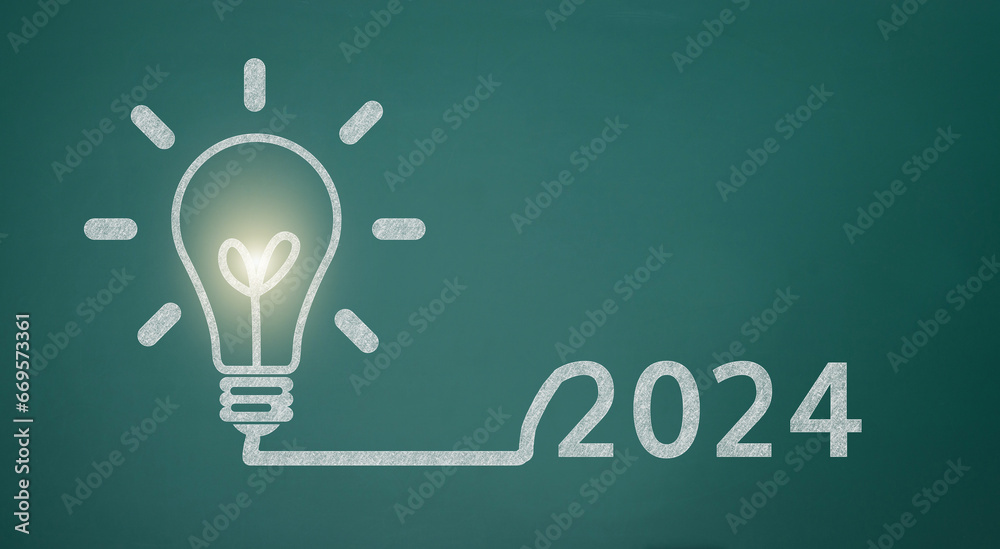 2024 light bulb on the blackboard - obrazy, fototapety, plakaty 