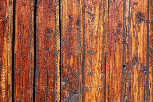 Textured surface of weathered old wooden planks.