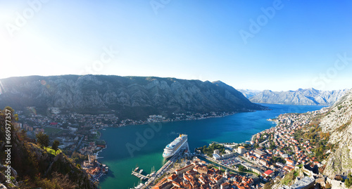 Top view of the old town in Kotor and a big cruise ship, Montenegro