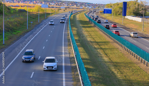 Car traffic on a country highway © Yuri Bizgaimer