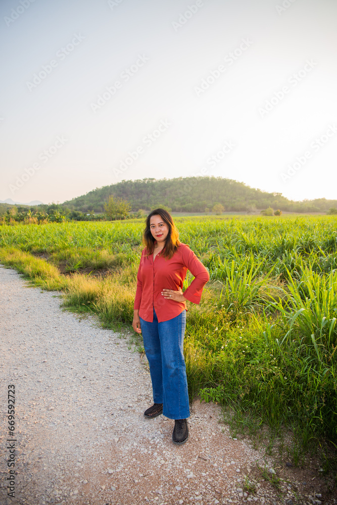 women asian standing on the countryside road