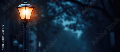 City street lamp at night captured up close © AkuAku