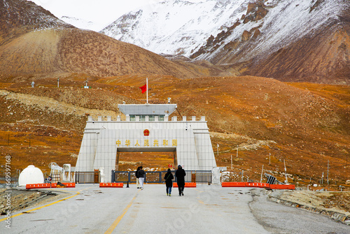 Khunjerab pass, Pakistan-China border and walking people.
