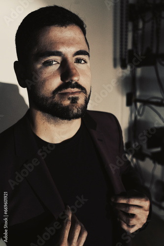 Man in suit and t shirt studio shot