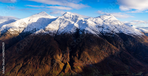 Kintail mountains of Scotland topped with Autumn snow