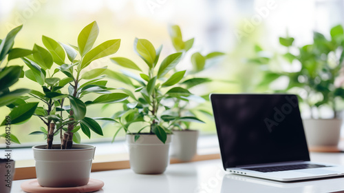 Office plants juxtaposed with modern tech gadgets emphasizing eco-friendly business tech, business technology background, blurred background, with copy space